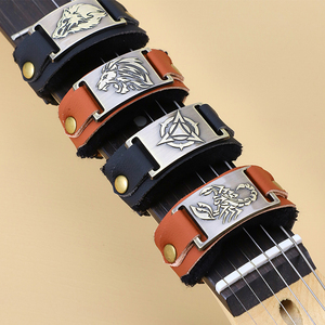 Jingying 2026 Venta al por mayor de fábrica: Amortiguador de cuerdas de guitarra profesional de alta gama personalizado, accesorios y piezas para correas de silenciación. - Product Image 1