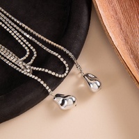 Collier long transfrontalier euro-américain, style minimaliste et polyvalent, avec pendentif en chaîne de bambou en fer orné de diamants, style Ins