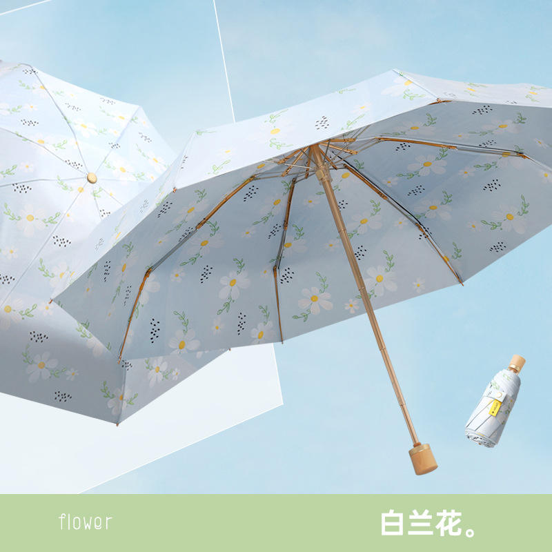 double-layer umbrella with gold frame and white orchid