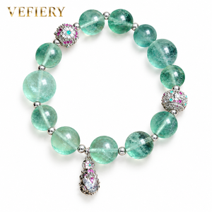 สร้อยข้อมือลูกปัดทรงกลมสีเขียวฟลูออไรต์พร้อมลูกปัดตกแต่งโทนสีเงิน - Product Image 1
