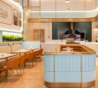 Ensemble de mobilier de restaurant de luxe : banquette en cuir avec dossier coquille et table pour restaurant haut de gamme, café ou restaurant décontracté
