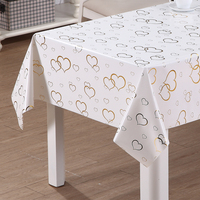 Nappe en PVC RNPT avec imprimé floral doré et bordure à motifs, avec support en tissu pour tables à manger