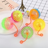 Vente chaude Coloré Glitter Ball Sifflet Clignotant Doux Piquant Jouet De Massage avec Corde Soulagement Du Stress Jouets En Gros