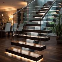 Cadre métallique durable de structure de poutre simple d'escalier flottant de tube carré avec l'éclairage d'étape de LED et les étapes en bois