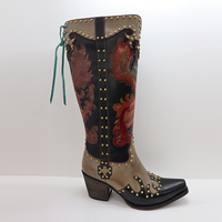 Vente en gros Bottes occidentales de luxe à la mode faites à la main avec bout pointu et talon épais, rivet rétro pour femmes aux genoux
