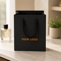 Sac en papier de marque imprimé couleur noir et blanc avec poignée en corde tressée pour boutique et magasin de détail