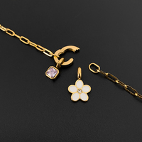 Bracelet chaîne trombone en acier inoxydable plaqué or 14 carats pour femme avec pendentif fleur en zircon violet, bijoux Emanco