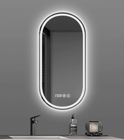Miroir LED ovale au design personnalisable, avec fonction anti-buée en un clic en option, pour salle de bain