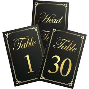 Numéros de table en feuille d'or 1-30 et carte de table de tête Cartes de sièges de lieu de mariage Cartes de numéros de table en noir et or