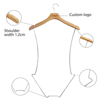 Vente en gros Nouveau design Cintre pour maillot de bain Logo personnalisé Cintres pour maillot de bain en bois et métal pour bikini Salle de bain Salon