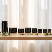 Vente en gros de pots cosmétiques noirs en verre de 1 à 18 oz, résistants aux UV, avec bouchon de sécurité pour enfants, pour concentrés