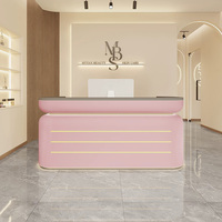 Mobilier commercial contemporain minimaliste rose blanc comptoir avant table de luxe salon de beauté réception pour magasin