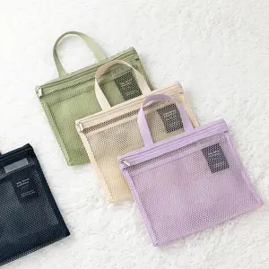 Vente en gros de sac à cosmétiques en maille à logo personnalisé avec fermeture à glissière sacs à maquillage portables en filet de voyage petit sac de toilette en nylon pour salle de bain