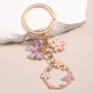 Lindo esmalte mariposa Sakura flor llavero hecho a mano aleación Zinc DIY joyería para mujeres niñas jardín llaveros amistad regalos - Product Image 3