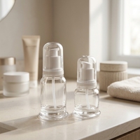 Flacon pompe rond en verre soufflé transparent 30ml 50ml avec surface givrée pour emballage de sérum cosmétique, huile essentielle, soin de la peau