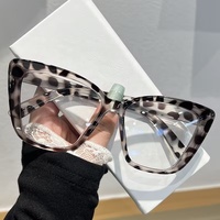 Lunettes de soleil œil de chat à grande monture pour femmes 2026, personnalisables avec logo, noires, promotionnelles, par Bulk