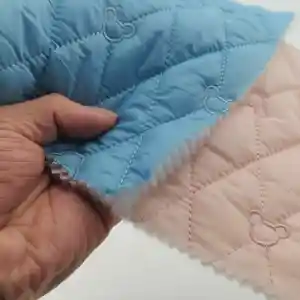 Lovely bear design lovely color stitch embossed diamond quilted nylon fabric for children coat and dress