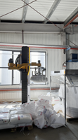 Robot de déballage automatique, machine à basculer les sacs PE de 25 kg, station de remplissage de sacs jumbo, système de transfert de granulés de résine