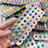 Vente chaude en gros de paquets de bonbons en forme de tablette, bonbons sucrés, chocolat coloré en forme de haricot