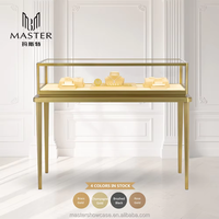 Vitrine de présentation de bijoux MASTER en verre élégant pour colliers, boucles d'oreilles, bagues, bracelets, chaînes de cheville, bijoux en or et en platine