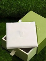 Boîte à bijoux de type tiroir vert terre avec pochette assortie pour l'emballage de bijoux fins