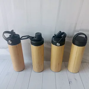 Ingrosso bottiglia d'acqua in acciaio inossidabile Unisex a doppia parete isolata con bottiglia di bambù diretta per bere in metallo