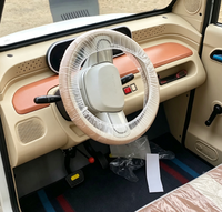 Voiture électrique à basse vitesse à 4 places avec cabine fermée, 4 roues, panneau solaire sur le toit, pour les trajets familiaux, SKD CKD disponible