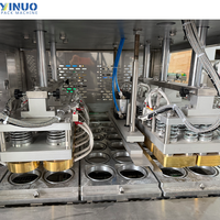 Machine de remplissage et de scellage automatique multi-têtes pour coupelles de sauce, biscuits et pâtes, avec balance intégrée