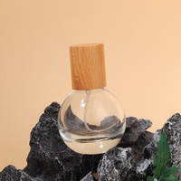 Nouveauté Bouteille de parfum transparente vide Portable ronde 30ml 50ml 80ml Bouteille d'atomiseur de parfum en verre avec emballage