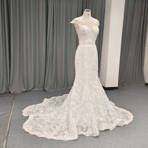 ANY243 Robe de mariée sirène moderne et glamour à manches courtes, avec broderie en dentelle, appliques florales en cristal, coupe ajustée et traîne chapelle longue - Product Image 2