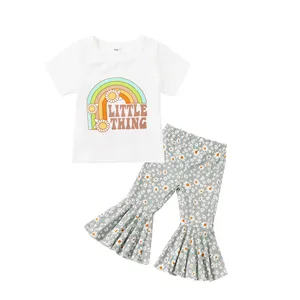 Moda çocuk yaz takım elbise yeni kısa kollu gökkuşağı T-shirt çiçek baskılı çan dipleri pantolon kız 2 adet giyim seti