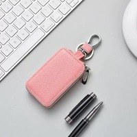 Porte-clés de voiture tendance en gros, étui souple en PU et cuir véritable avec fermeture éclair pour homme et femme, mini portefeuille pour clés