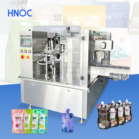 Machine de remplissage et de scellage de sachets préformés à bec verseur HNOC pour jus de fruits