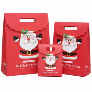 स्टॉक में पर्यावरण के अनुकूल उच्च गुणवत्ता Bolsa डे Papel डे Navidad के साथ मीरा क्रिसमस कैंडी उपहार भले पेपर बैग मर कट संभाल