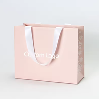 Vente en gros d'usine Sacs en papier cartonné sac à provisions en papier sac cadeau de luxe personnalisé avec poignées logo pour vêtements de travail