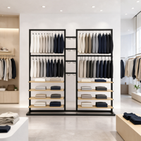 Étagère de présentation de vêtements en métal noir double face à deux niveaux avec étagères en bois et base en U – Vente en gros
