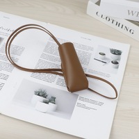 Pochette de rangement mini décorative en cuir de vachette pleine fleur, design de niche, avec cordon de cou, pour rouge à lèvres et porte-clés portable