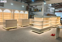 Conception d'intérieur complète pour magasin de cosmétiques sur mesure : mobilier, armoire murale LED, comptoir îlot, bureau de réception