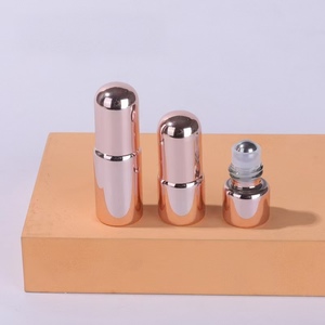 Botellas cilíndricas de oro rosa de 1 ml para cuidado personal, recargables, con tapa de bola giratoria - Product Image 3