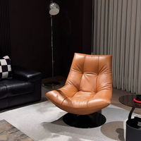 Fauteuil de salon design italien sans accoudoirs, pivotant et rembourré, avec base sur piédestal, pour villa, salon ou hôtel