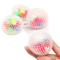 Balle anti-stress TPR personnalisable, jouet sensoriel transparent texturé 6 cm pour la coordination œil-main et l'entraînement de la préhension, OEM