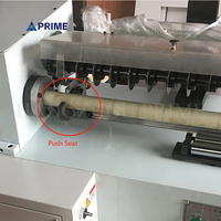 Machine de découpe semi-automatique pour tubes en papier, avec couteaux rotatifs pour le refendage de cartons et de noyaux en carton