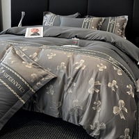 Parure de lit quatre pièces jacquard gaufré de luxe léger, broderie et empiècements, douce pour la peau, haut de gamme, motifs plantes et fleurs