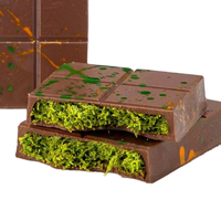 Snacks Saveur Chocolat-Pistache Style Dubaï en Gros, Pièces et Barres de Chocolats et Biscuits aux Noix à Motif de Fèves Très Demandés