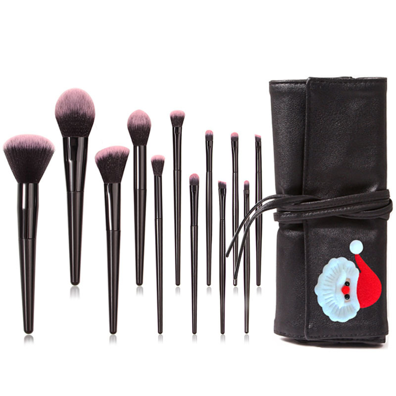set of 12 brushes + black 12-hole pebbled strap bag