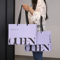Sac d'emballage en papier lavande imprimé sur mesure avec poignée en ruban, sac cadeau de luxe pour boutique de vêtements