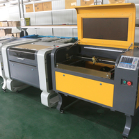 Machine de gravure laser CO2 portable refroidie par eau 6040 4060 50W 60W 80W 100W avec composants HIWIN et contrôle Ruida pour métal, bois, caoutchouc, IA