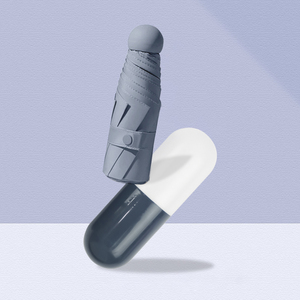 Parapluie promotionnel classique pliable de <span class=keywords><strong>voyage</strong></span> et d'extérieur, mini, anti-UV, transparent, manuel, à cinq plis, capsule, avec logo personnalisé, idéal pour cadeaux - Product Image 1