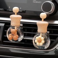 Flacon de parfum personnalisé de dessin animé mignon 8ml 10ml 15ml Flacon diffuseur de dessin animé pour le parfum de voiture avec couvercles en bois