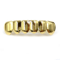 Nouvelle couleur or plaqué véritable brillant Hip Hop dents pour la bouche Grillz casquettes haut et bas ensemble de gril dents de Vampire pour unisexe